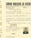 Registo de matricula de cocheiro profissional em nome de António Gomes, morador em Monte Santos, com o nº de inscrição 702.