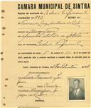 Registo de matricula de cocheiro profissional em nome de Fernando Luís António da Costa, morador em Almoçageme, com o nº de inscrição 990.