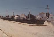 Casas e poço de Gouveia, Aldeia em Verso.