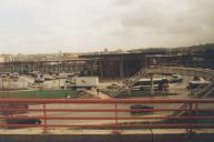 Estação dos Caminhos de Ferro de Queluz-Massamá com o terminal Rodoviário e vista panorâmica de Queluz e Massamá.