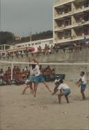 Jogo de Voleibol na Praia Grande.