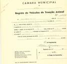 Registo de um veiculo de quatro rodas tirado por dois animais de espécie bovina destinado a transporte de mercadorias em nome de Júlio Canas Pereira, morador no Casal de Vale Mourão, Cacém.